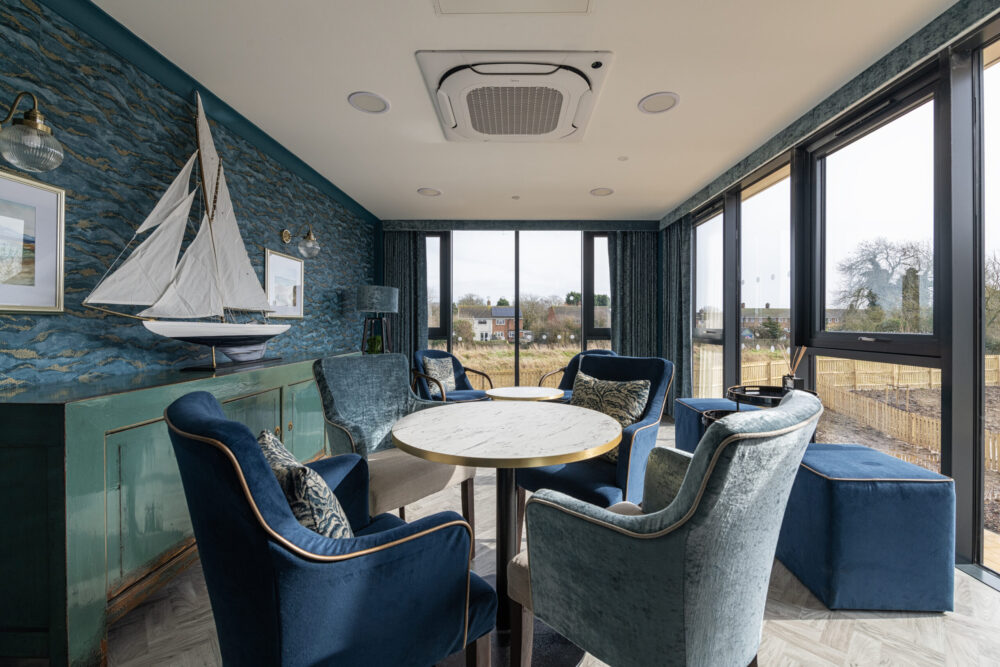 Themed lounge with garden views at [HOME-NAME]